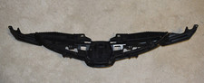 Mazda 2 front bumper badge mounting piece. Part number DOIN 50712 K2443
