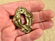 Ornement de meuble entrée de serrure en bronze laiton style Louis XV rocaille