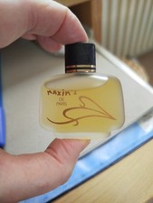 Une Miniature De Parfum Maxim