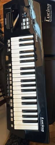 Roland lucina 37 - roland, ax-09
