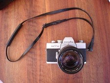 Minolta SRT 101 (argentique) + objectif Rokkor 50-135 mm + déclencheur souple