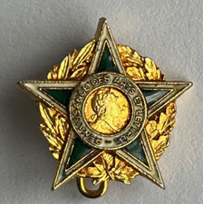 Antique Renaissance decoration of art and letters buttonhole