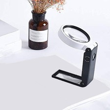 Loupe avec lumière et loupe