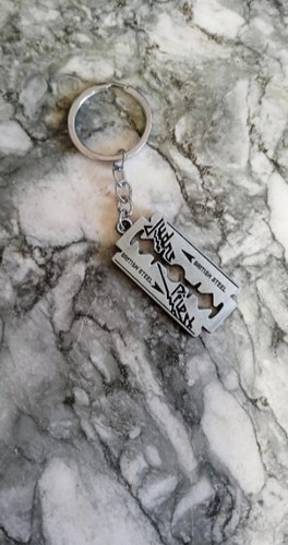 Porte clés judas - porte,