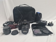 Canon EOS 1000d Digital SLR Camera 18-55mm Zoom Lens & 50mm EF f1.8 Prime Lens