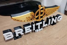 Logo Breitling (Gold)