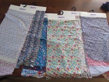 SIX FABRIC COUPON DISPLAYS. Brand LIBERTY.