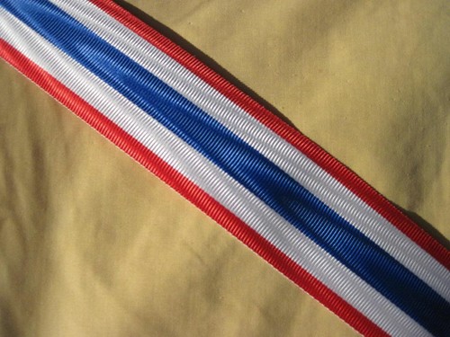 Coupe ruban médaille la - de,