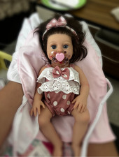bébé reborn full silicone fille avec lot de vêtement inclus 