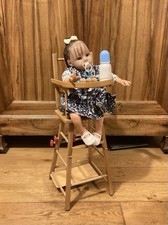 Chaise haute de poupée