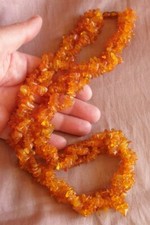 Collier en morceaux d' ambre couleur miel à 3 rangs tressés - 87,68 grammes