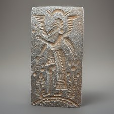 Petite tuile ancienne du