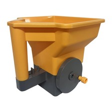 Épandeur à main pour fosses