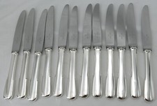 Ravinet d'Enfert Uniplat, 12 table knives, silver metal, excellent condition.