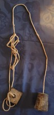 OLD LEAD WIRE 5CM DIAMETER, LENGTH 6CM, SLIGHTLY WORN CORD, RUSTY METAL