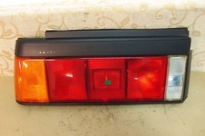 NOS LH GENUINE MITSUBISHI TREDIA TAILLIGHT REAR LAMP - BLACK SURROUND # MB283803