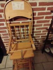 chaise haute bébé de marque COMBELLE en bois très bon etat