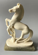 Statuette de cheval signée A
