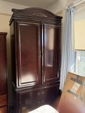 Solid wood armoire with 2 interior drawers and shelving