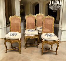 SÉRIE DE 4 CHAISES CANNÉES EN BOIS SCULPTÉ ET DORÉ DE STYLE LOUIS XV ÉPOQUE XIXe