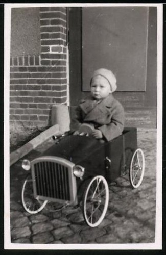 Photographie enfant assis dans