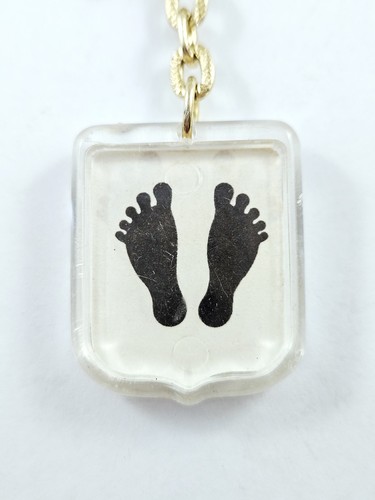 Porte cles pieds noirs - porte-cles,