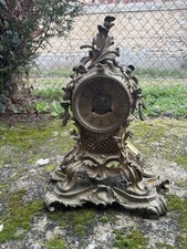 Pendule cartel en bronze doré