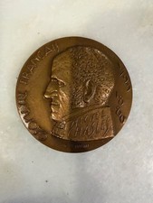 Ancienne médaille en bronze