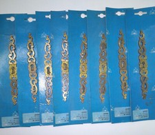 LOT DE 8 DECORS BRONZE POUR
