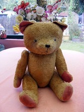 Ours Ancien remplis de paille en etat d'origine hauteur 67 cm né vers 1950.