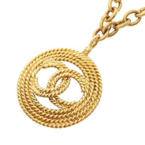 Collier long pendentif rond