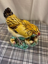 POULE AVEC SES POUSSINS EN