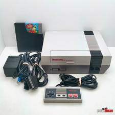 CONSOLE NINTENDO NES FRA AVEC CABLES OFFICIELS + 1 MANETTE & 1 JEU SIMPSON / TBE