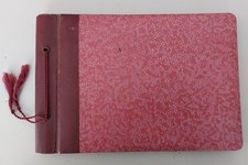 Album photos ancien vide . 40 pages vierges. 19X 28 Cm . Très bon état .