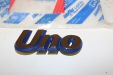 logo, insigne coffre neuf d'origine  UNO 7727116 FIAT UNO TURBO IE