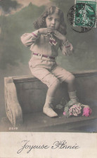 CP HAPPY YEAR CHILD SITTING ON