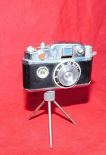 petrol lighter old ORIENTAL camera on tripod it works