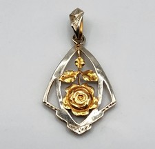 Bijou pendentif en or blanc et jaune 18 carats ajouré décor de rose Art Nouveau