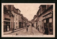 Old postcard Saint-Amand-Montrond, Rue Entre-les Deux-Villes 