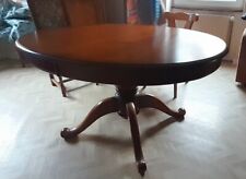 table ovale pied central merisier