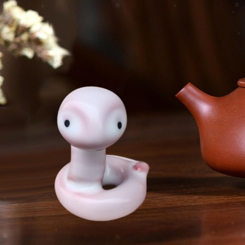 Figurine serpent en - de,