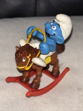 Schtroumpf cheval à bascule