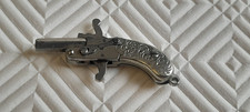 PISTOLET PENDITIF A BROCHES
