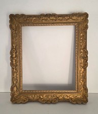 Ancien cadre en bois sculpté