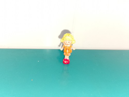 Polly pocket figurine doll