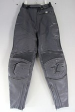 RICHA BLACK LEATHER BIKER TROUSERS: SIZE 10 WAIST 26 INCHES/INSIDE LEG 27 INCHES
