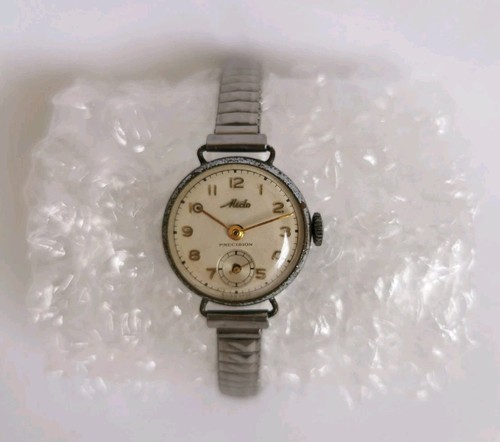 Mido montre precision - mido,