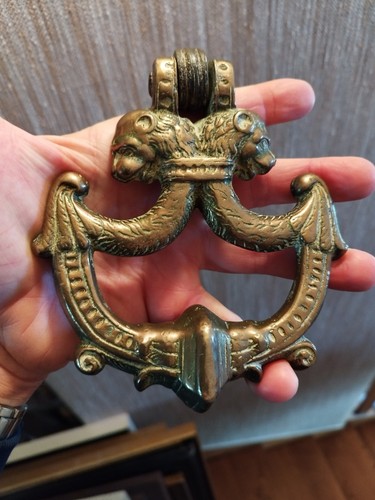 Heurtoir porte bronze à - de,