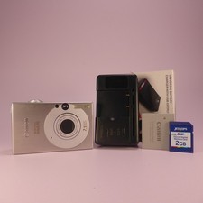Canon Digital Camera IXUS 70 Powershot SD1000 7.1MP Silver Tested Full Set