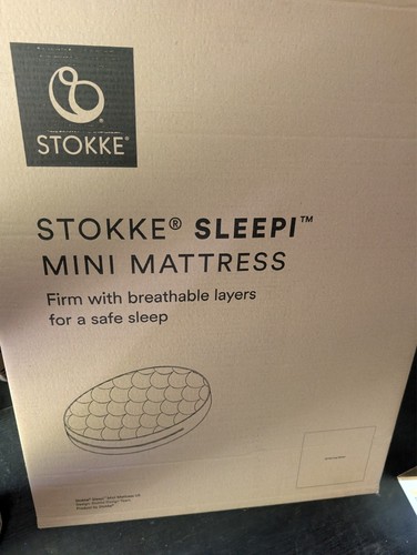 New and unopened stokke - and,